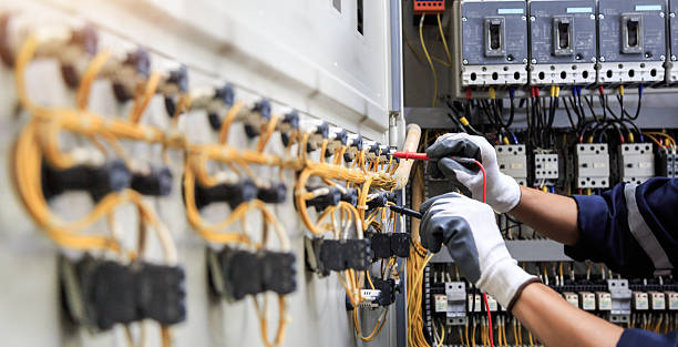Professional Electrician technician working in Atkins, IA